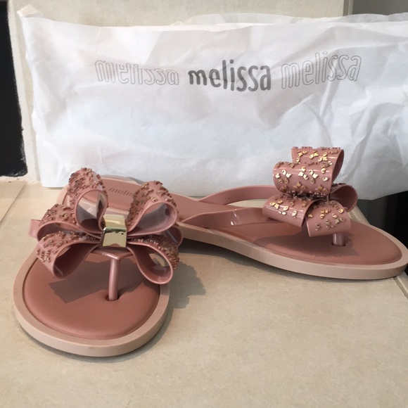 rose gold bow flip flops